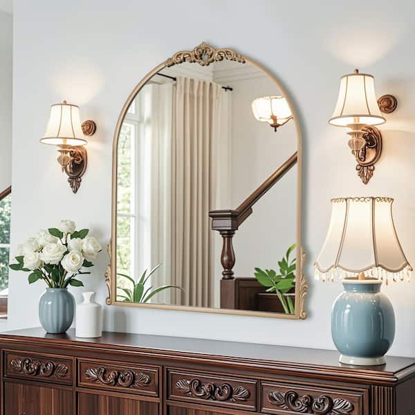 Elevatehome 24 in. W x 32 in. H Intricately Carved Gold Arched Framed Wall Bathroom Vanity Mirror in Cast Iron Floral