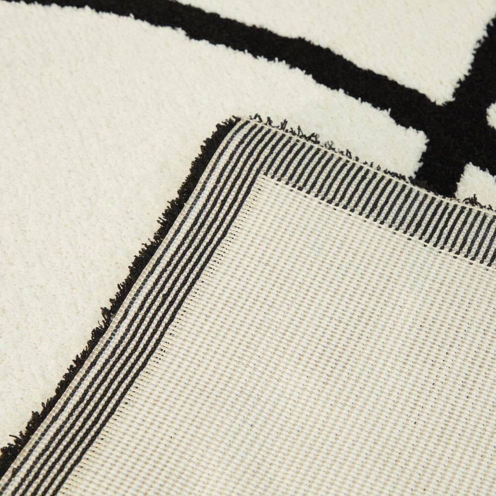 Cajal White and Black Abstract Kids' Rectangular Area Rug 5' x 7'
