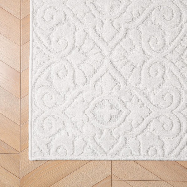 Feya Solid Ivory 2 ft. x 6 ft. Tufted Medallion Polypropylene Runner Rug