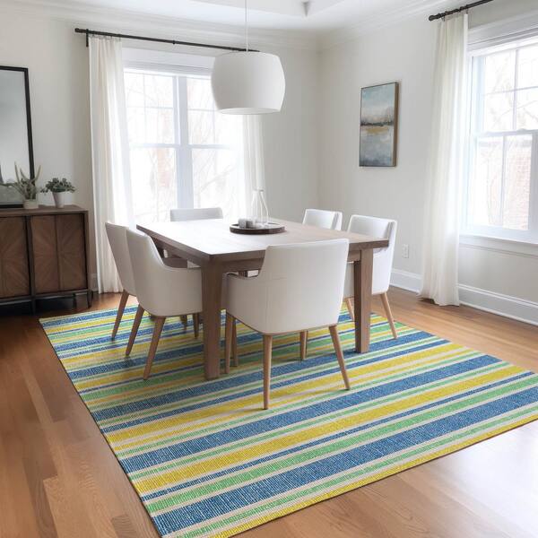 https://images.thdstatic.com/productImages/56d2e347-a36c-5bf6-80df-c55ecf1e9a4e/svn/yellow-addison-rugs-area-rugs-acn531ye5x8-31_600.jpg