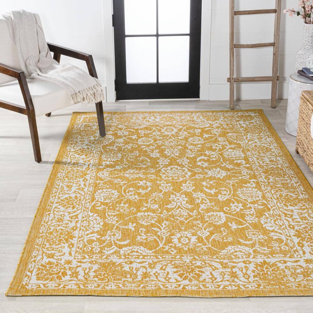 9' x 12' Yellow and Cream Floral Synthetic Rectangular Rug