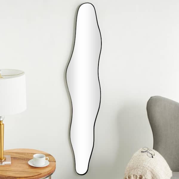Litton Lane 59 in. x 12 in. Slim Abstract Wavy Asymmetrical Framed Black Wall Mirror