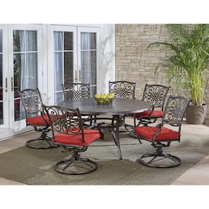 Traditions 7-Piece Aluminum Outdoor Dining Set with 6 Swivel Rockers with Red Cushions and Cast-Top Table