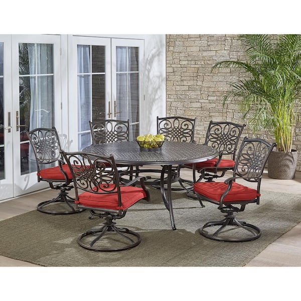 Hanover Traditions 7-Piece Aluminum Outdoor Dining Set with 6 Swivel Rockers with Red Cushions and Cast-Top Table