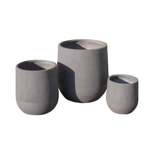 Typeface 21.7 in., 15.7 in. and 11.8 in. Dia Grey Weathered Finish Concrete Planters with Drainage Holes (3-Pack)