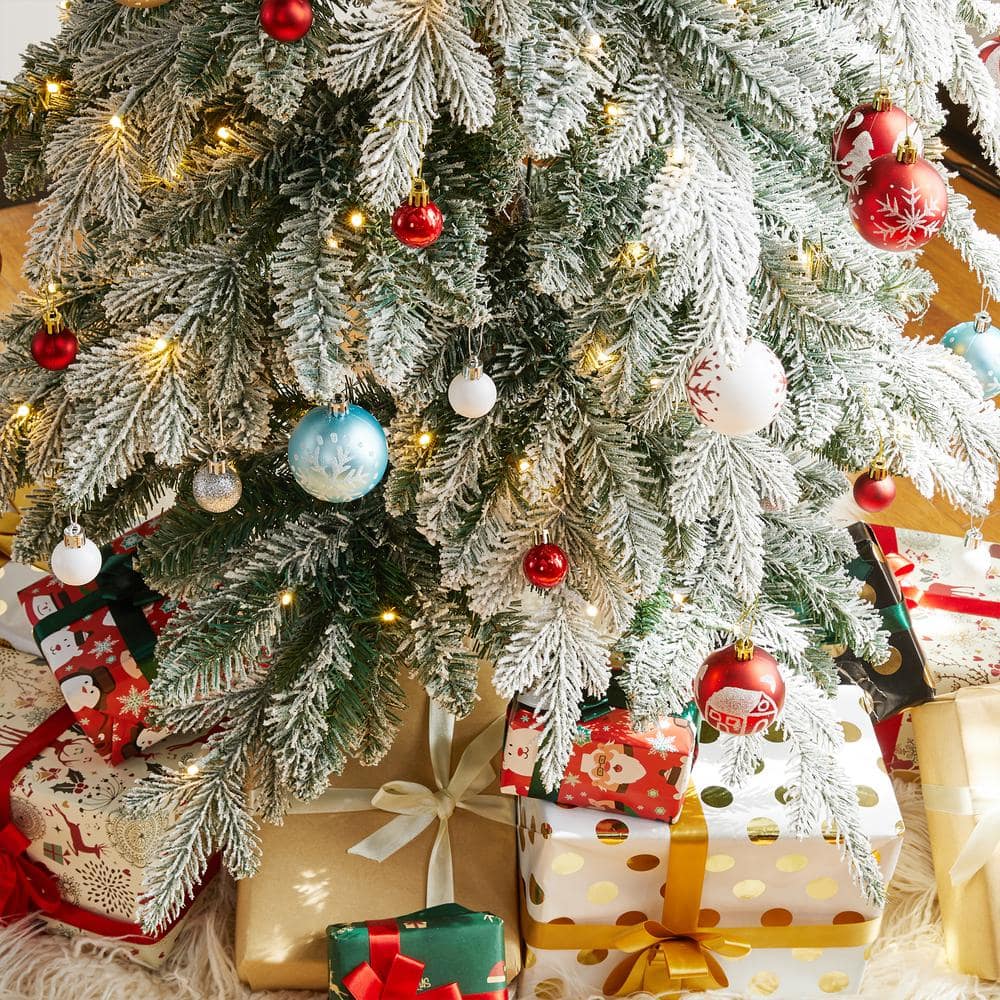 9ft Narrow Flocked Spruce Christmas Tree with Warm White Lights