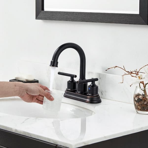 4 in. Centerset Double Handle High Arc Bathroom Faucet with Lift Rod Drain Assembly in Oil Rubbed Bronze