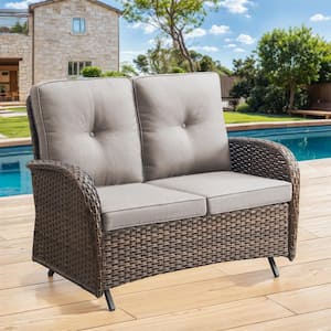 Brown PE Wicker Outdoor Loveseat with Beige Cushions and Glide Function