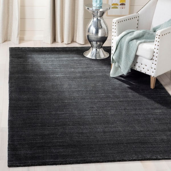 Mirage 6 ft. x 9 ft. Charcoal Distressed Solid Color Area Rug