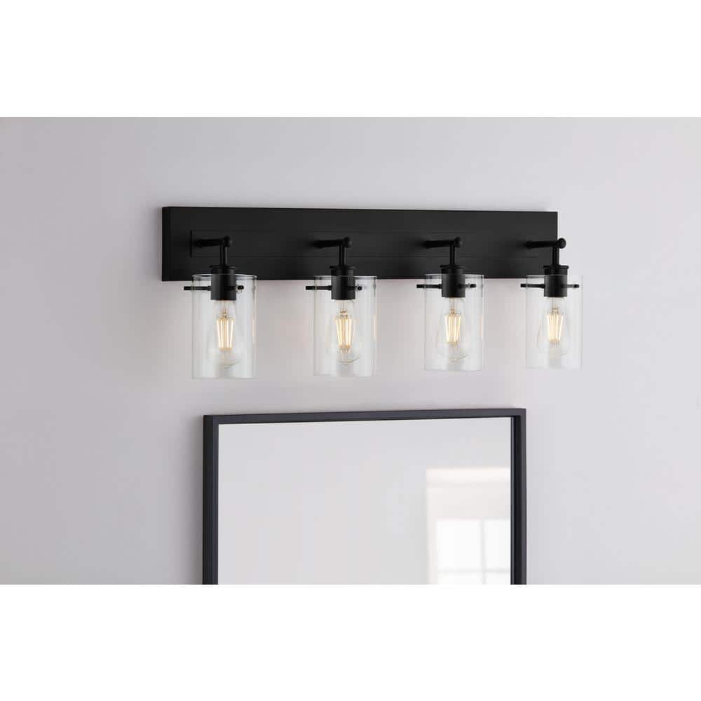 Hampton Bay Regan 29.25 in. 4-Light Matte Black Bathroom Vanity Light with Clear Glass Shades DSHD19574V3