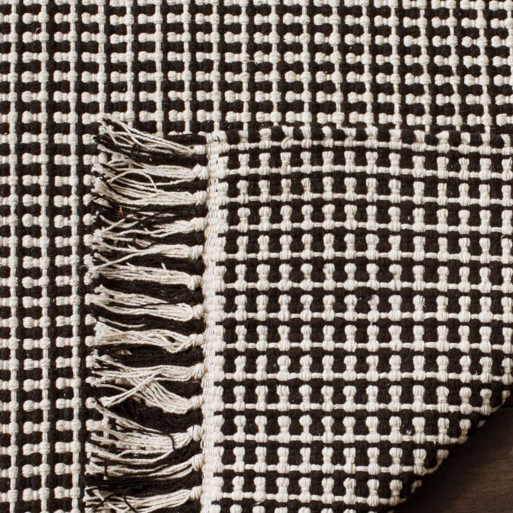 Ivory and Black Handwoven Cotton 8' x 10' Area Rug