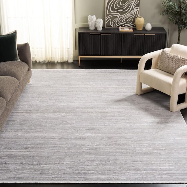 Platinum 9 ft. x 12 ft. Beige/Ivory Solid Color Distressed Area Rug
