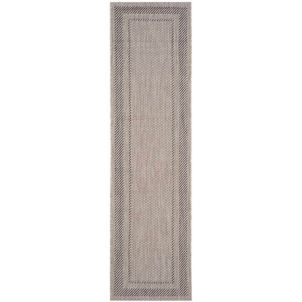 Beige and Black Synthetic 27'' Indoor/Outdoor Runner Rug