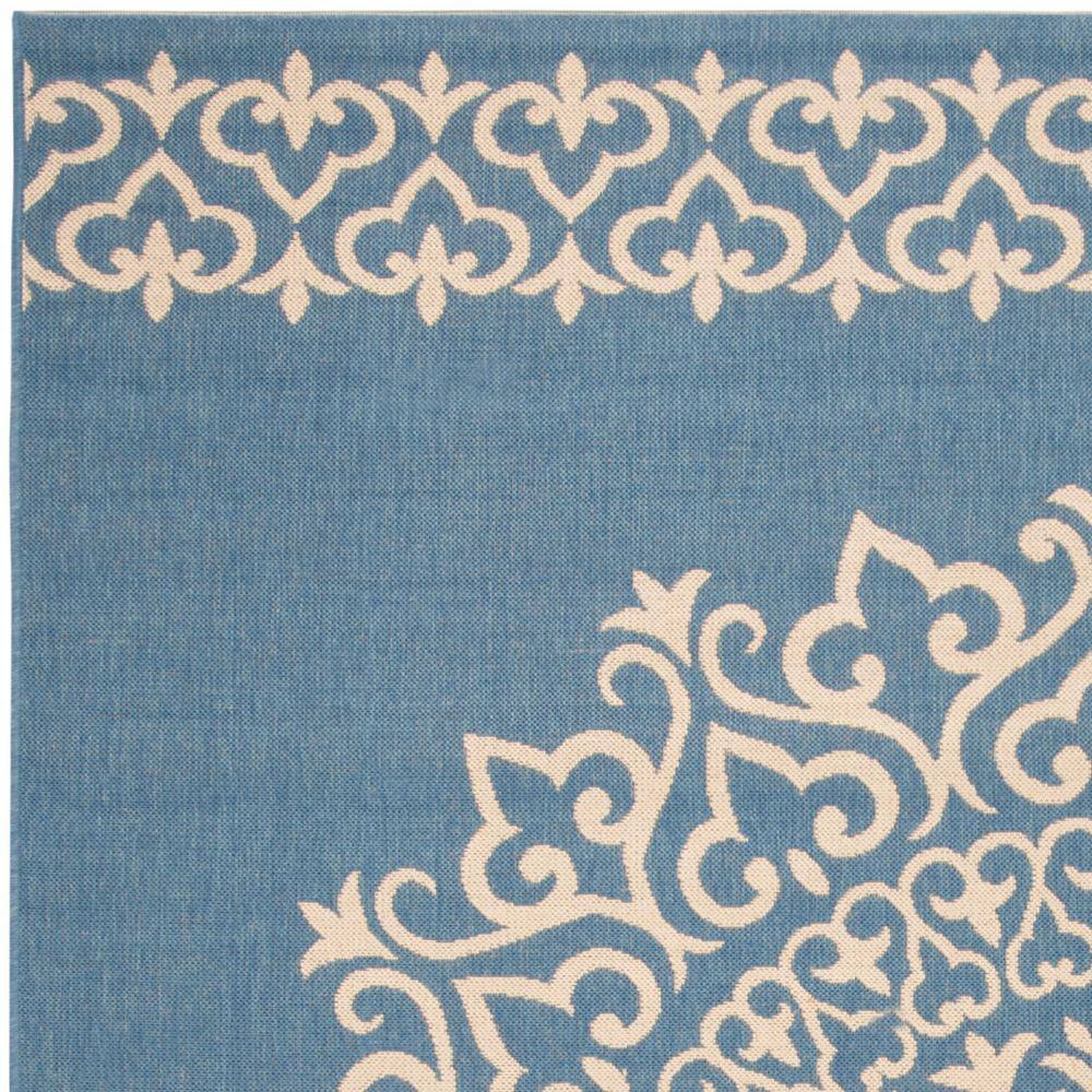 Cream and Blue Medallion Synthetic 8' x 10' Reversible Area Rug