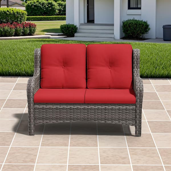 Brown Wicker Outdoor Patio Loveseat with Red Cushions