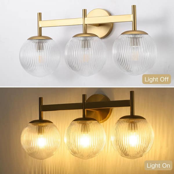 Noble 21.9 in. 3-Light Vintage Industrial Brushed Gold Bathroom Vanity Light with Round Clear Globe Ribbed Glass Shade