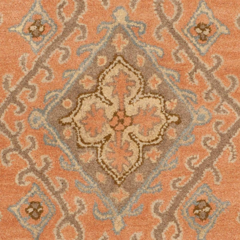 Hand-Tufted Terracotta Floral Wool Area Rug, 6' x 9'