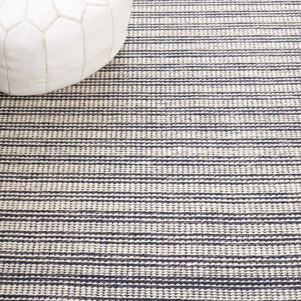 Ivory and Navy Tufted Wool Rectangular Area Rug, 5' x 8'