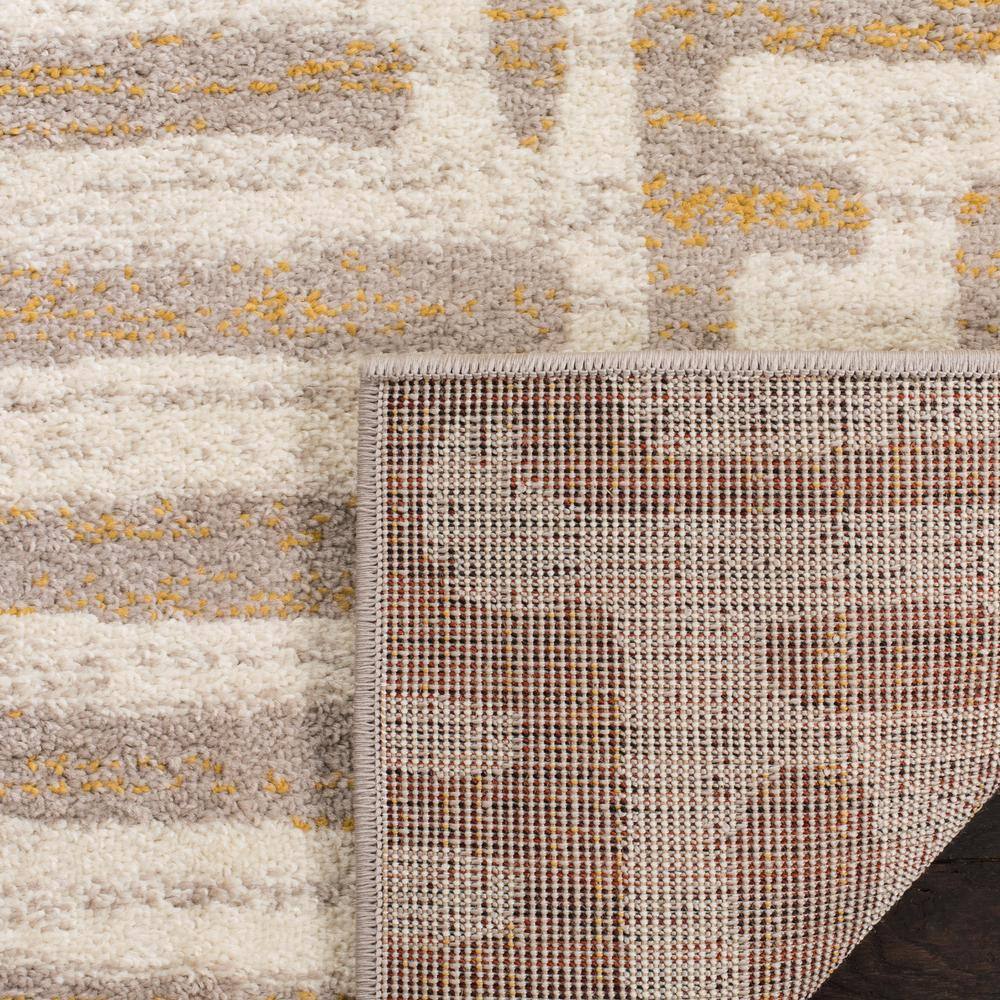 Ivory and Mauve Round Synthetic Abstract Area Rug
