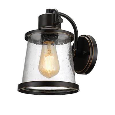 Charlie Collection 1-Light Oil-Rubbed Bronze LED Outdoor Wall Sconce with Clear Seeded Glass Shade, LED Bulb Included