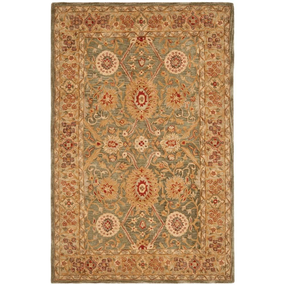 https://images.thdstatic.com/productImages/57bf2505-0e3b-4962-9394-cdc252bd4157/svn/sage-ivory-safavieh-area-rugs-an516a-6-64_1000.jpg