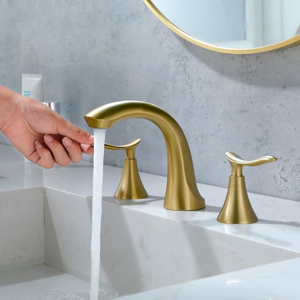 https://images.thdstatic.com/productImages/57c5a8ff-44ed-44b3-8498-6366becebafe/svn/brushed-gold-watwat-widespread-bathroom-faucets-smd0jn022063006-31_600.jpg