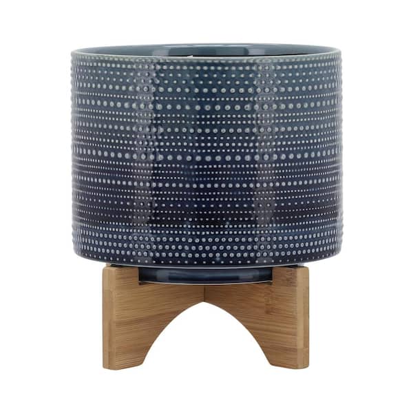 Liv & Skye 8 in. x 10 in. Blue Ceramic Dotted Decorative Pot With Wood Stand