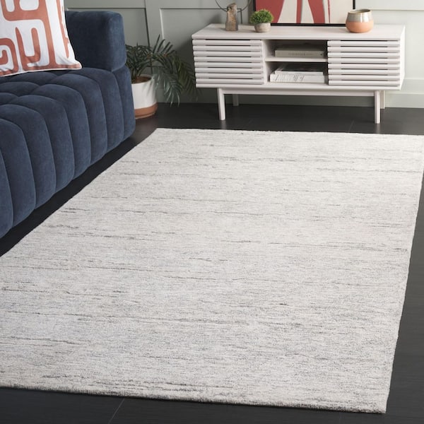 Ebony 9 ft. x 12 ft. Ivory/Dark Gray Abstract Modern Area Rug