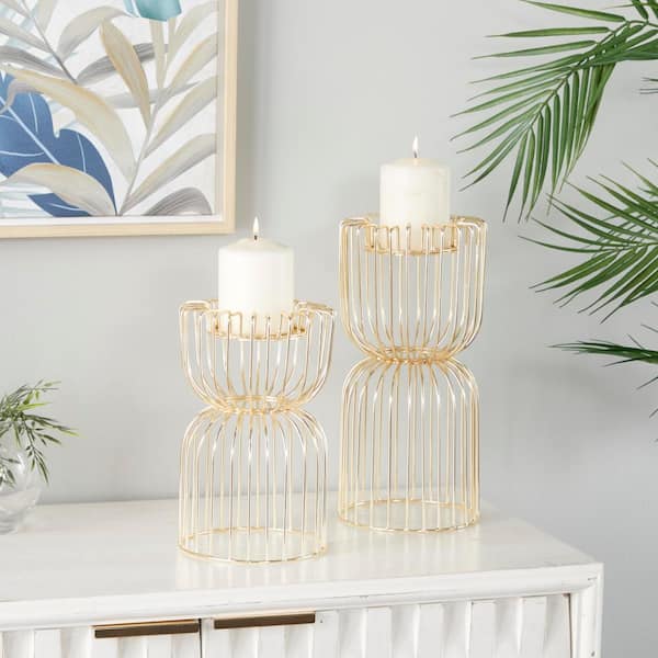 CosmoLiving by Cosmopolitan Gold Metal Pillar Candle Holder (Set of 2)  040272 - The Home Depot