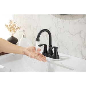 Mondawell Swivel 4 in. Centerset Double Handle Mid Arc Bathroom Faucet with Drain and Supply Lines in Matte Black