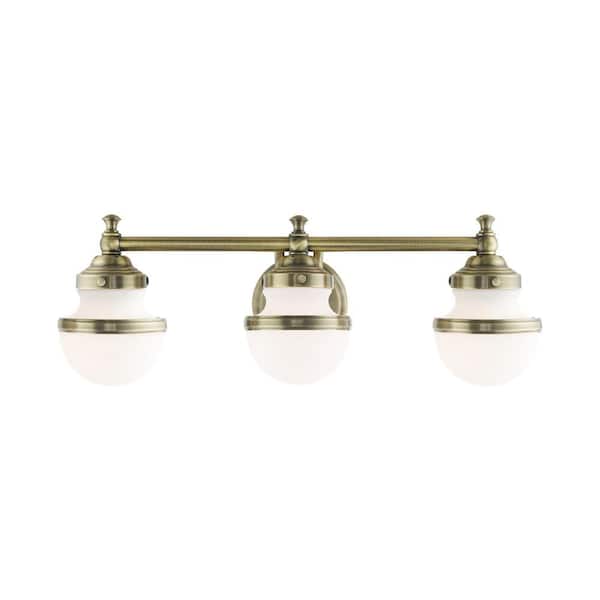 Livex Lighting Oldwick 3 Light Antique Brass Vanity Sconce 571301