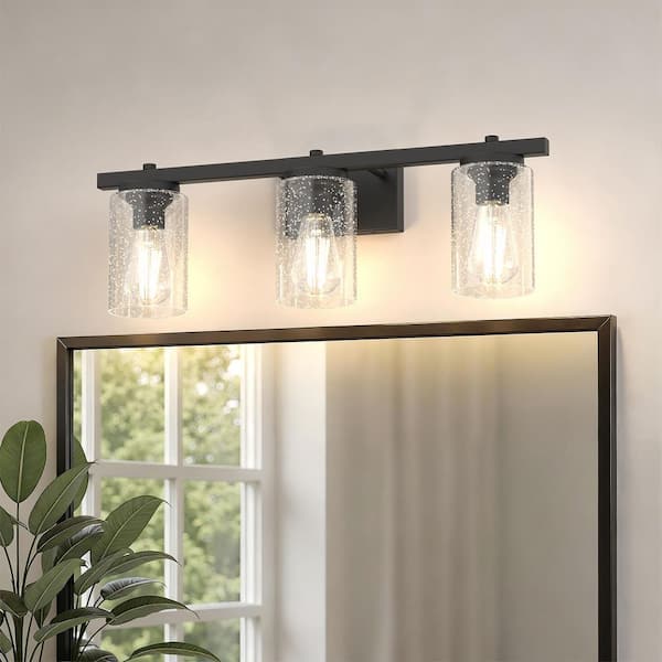24 in. 3-Light Black Metal Vanity Wall Light with Curved Clear Glass Cylinder Shades