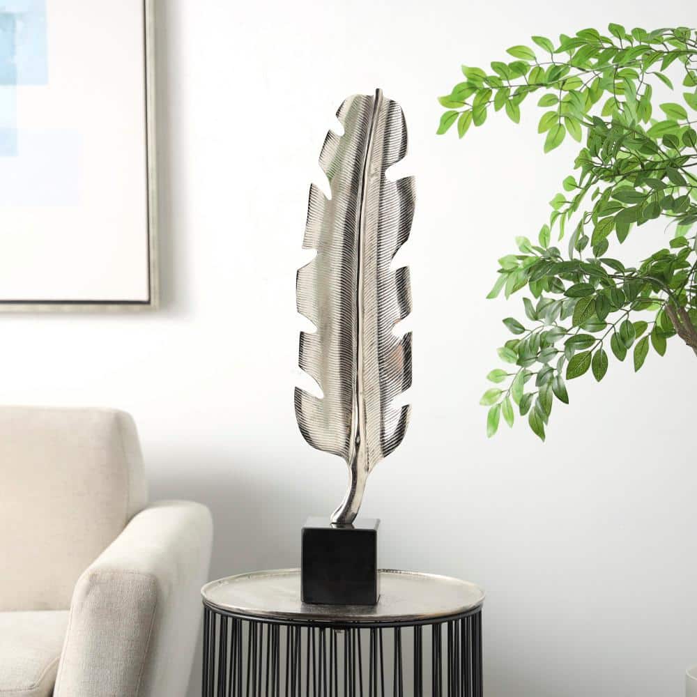 CosmoLiving by Cosmopolitan 28 in. Silver Aluminum Feather Bird Sculpture with Black Marble Base