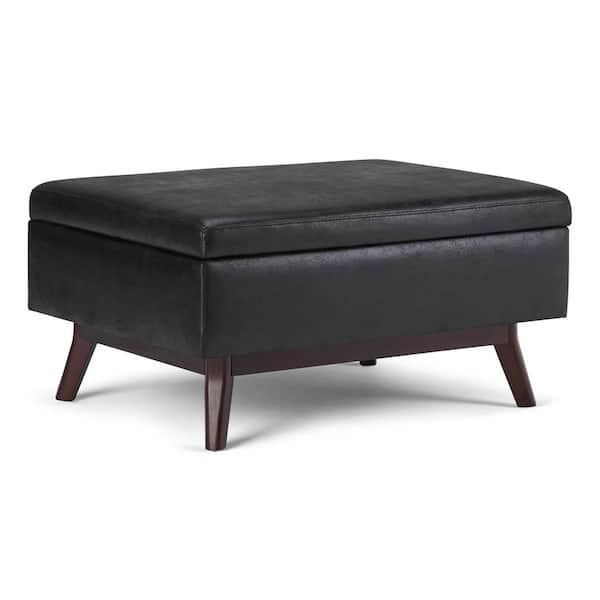 Simpli Home Owen 34 in. Wide Mid Century Modern Rectangle Coffee Table Storage Ottoman in Distressed Black Vegan Faux Leather