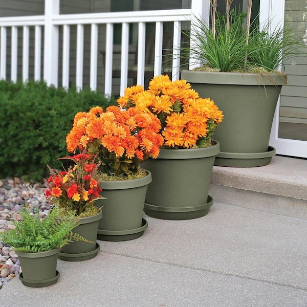 Stacking Planter with tiered volumes conceals built-in water saucer