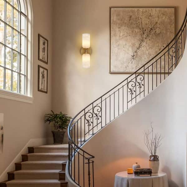 A Group of Brass and Plaster Sconces