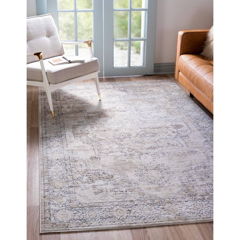 Ivory and Gray Geometric Synthetic 6' x 9' Area Rug