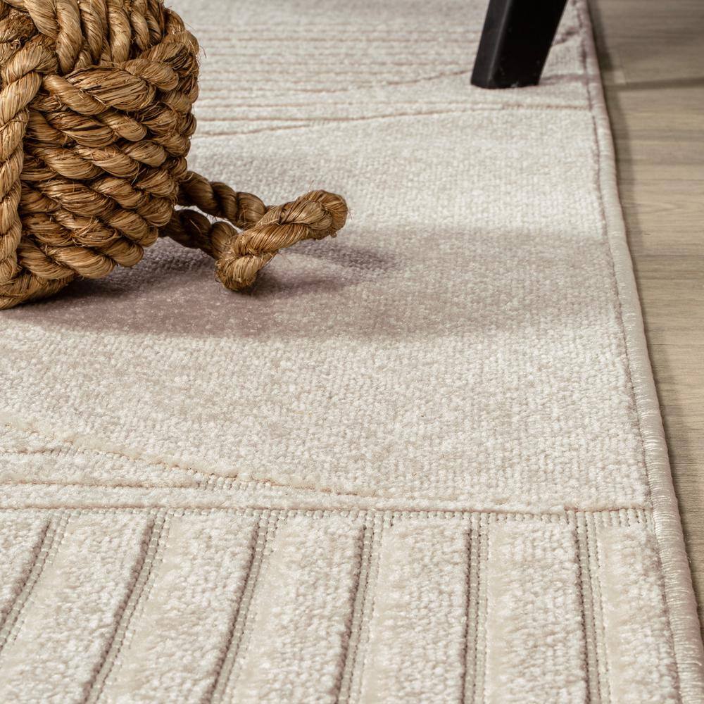 Ivory and Cream Geometric High-Low 8' x 10' Area Rug