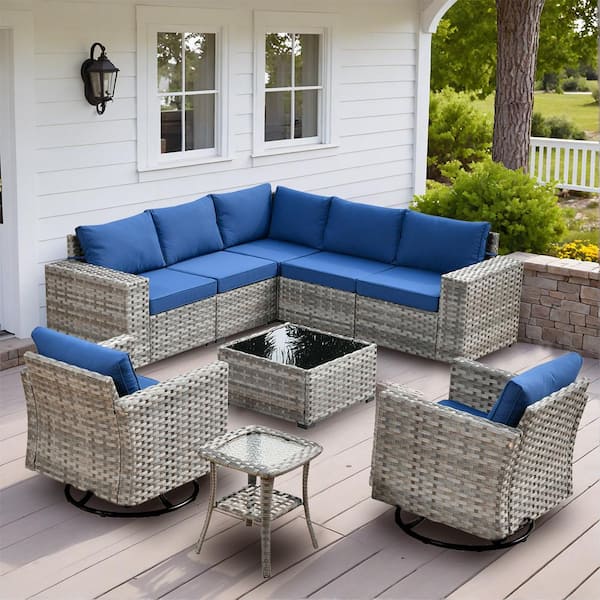 Beatrice 9-Piece Wicker Patio Conversation Seating Sofa Set with Navy Blue Cushions and Swivel Rocking Chairs