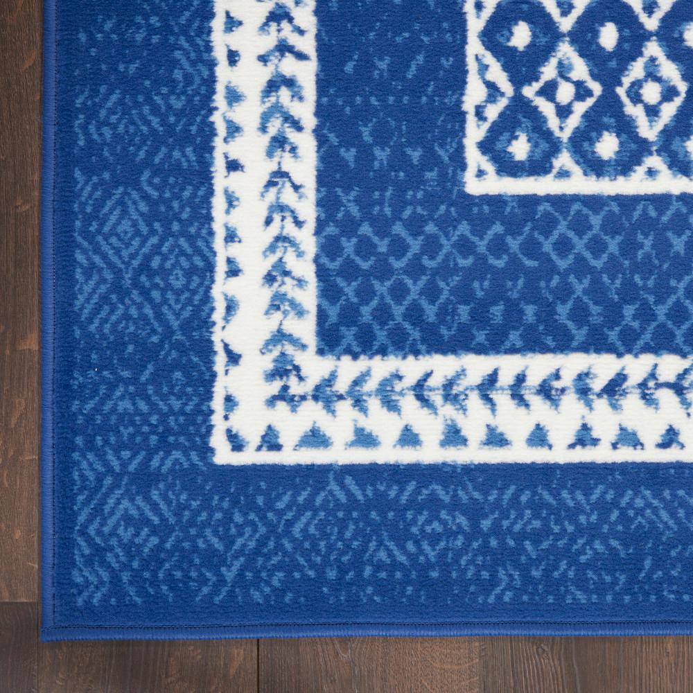 Navy and Ivory Geometric Bohemian 5' x 7' Area Rug