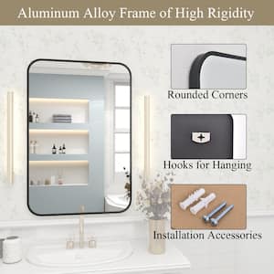 24 in. W x 36 in. H Rectangular Aluminum Alloy Framed Rounded Black Wall Mirror