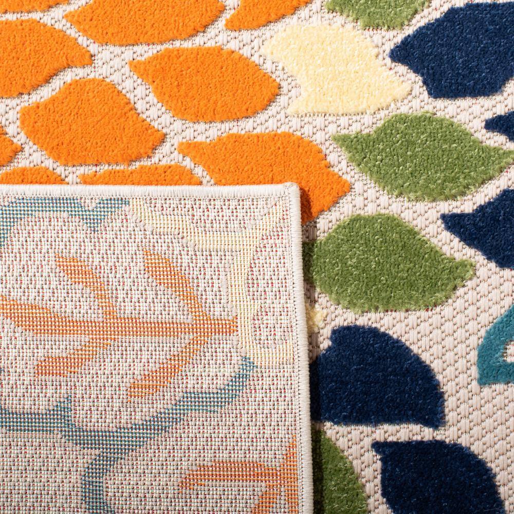 Ivory and Orange Floral Synthetic 9' x 12' Area Rug