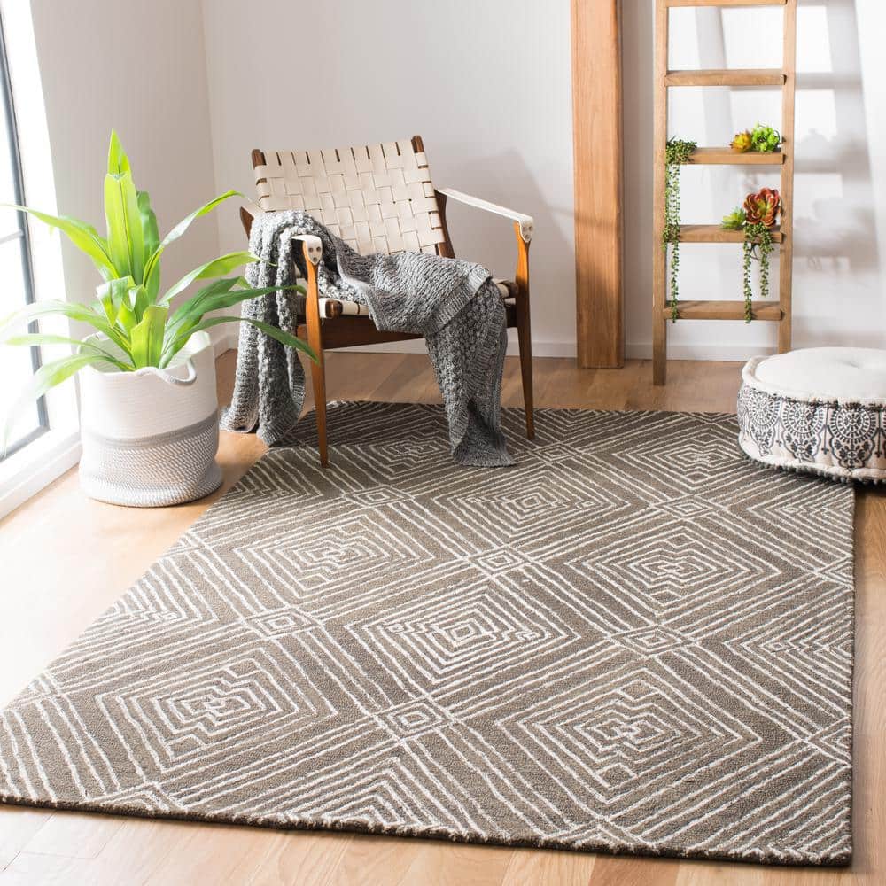 Handmade Dark Grey and Ivory Wool Tufted Round Area Rug