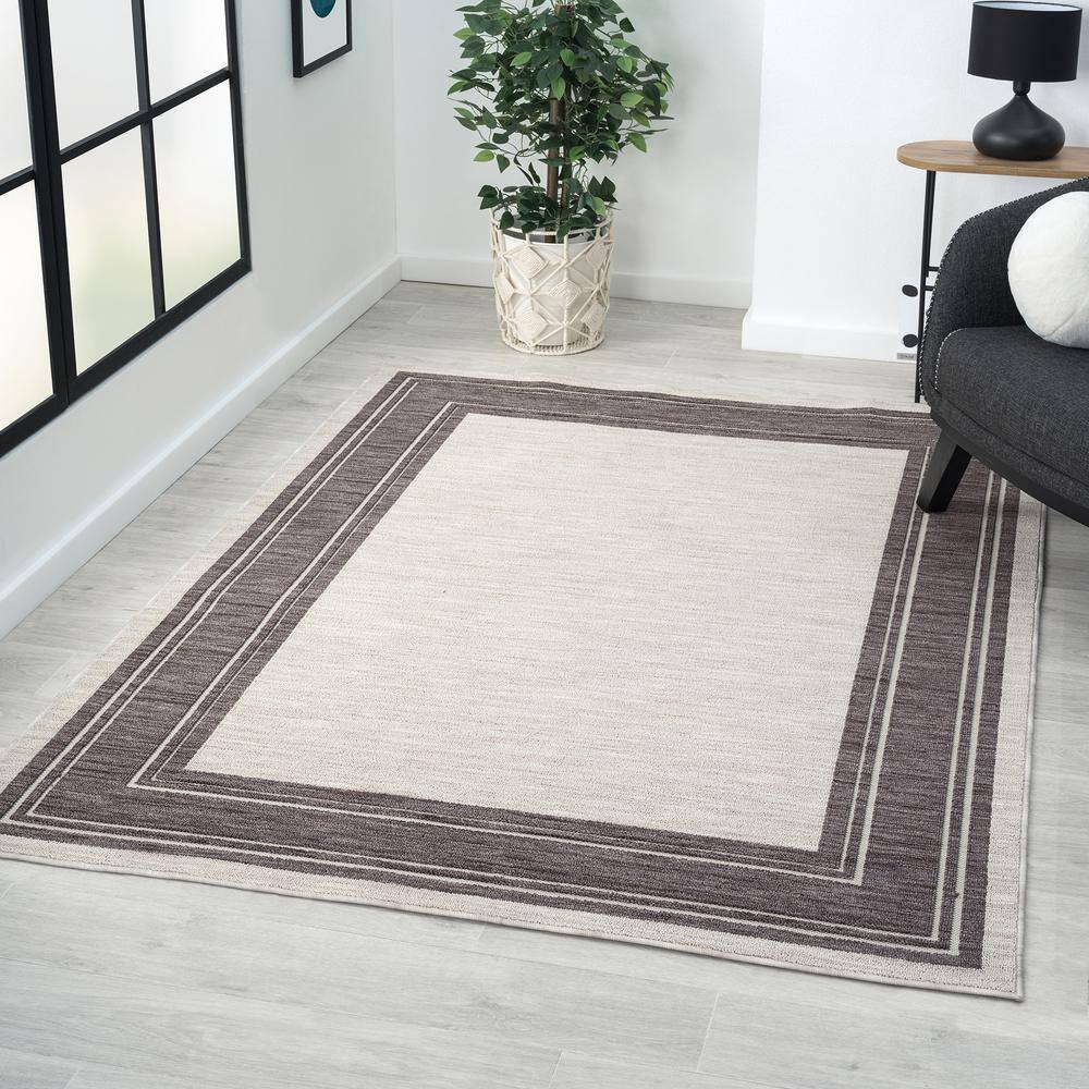 Winona 5' x 7' Ivory Rectangular Synthetic Area Rug