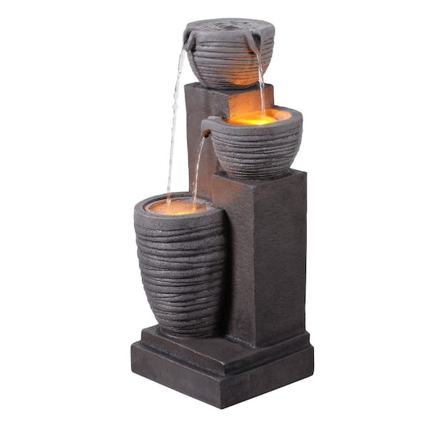 Horizontal Ribbed Pattern Outdoor Cascade Water Fountain with Warm Glow Lighting, Adjustable Flow and Electric Pump