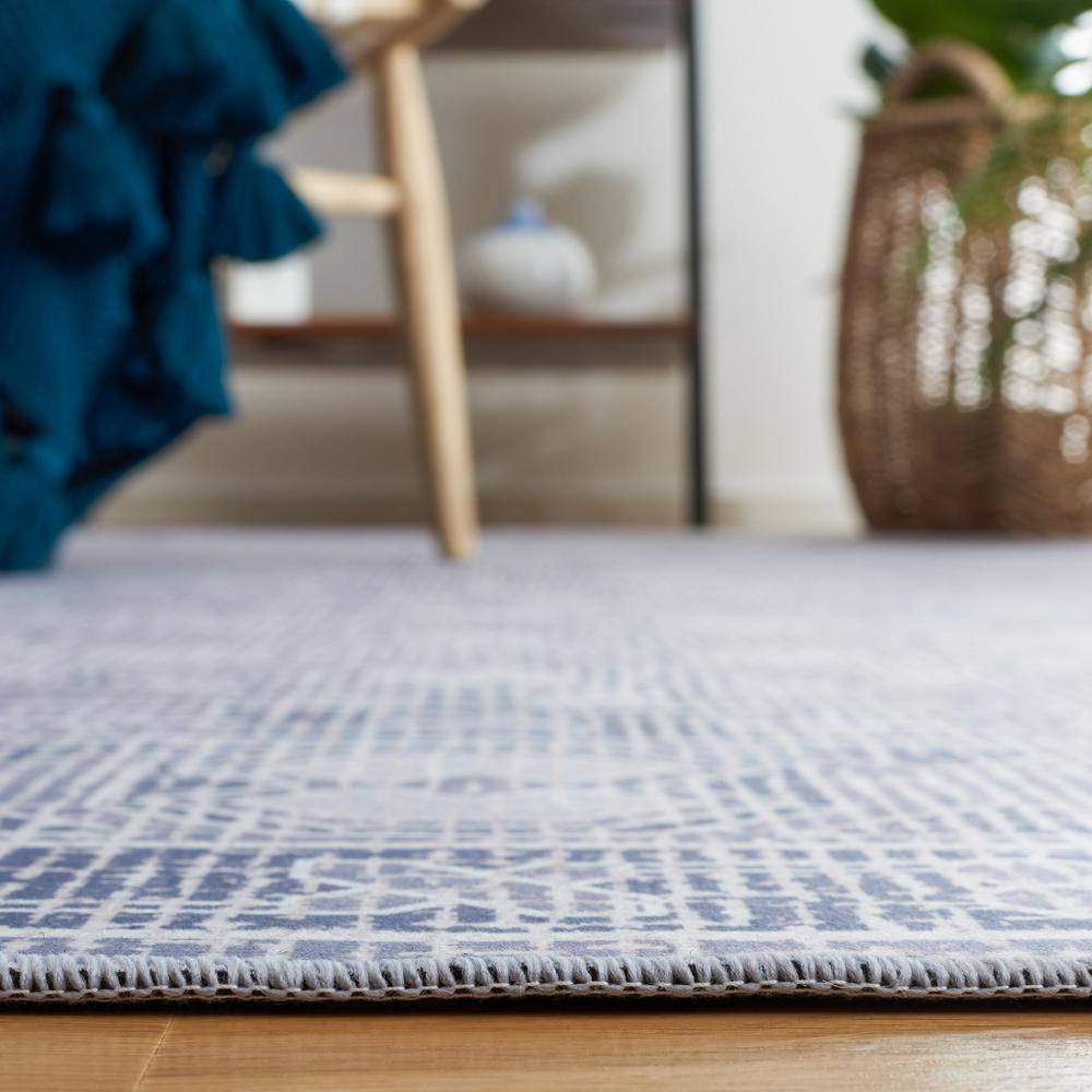 Tucson Ivory and Grey Synthetic Washable Area Rug 3' x 5'