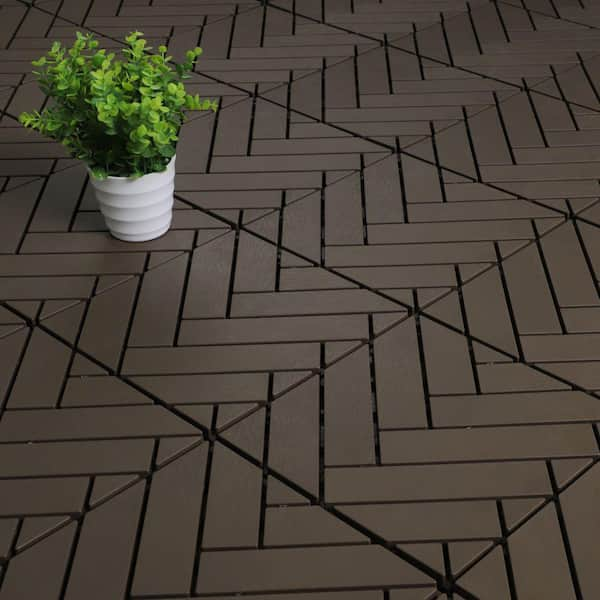 https://images.thdstatic.com/productImages/58e0b4ce-a97e-4c31-8ffd-1df4e22c1530/svn/chocolate-courtyard-casual-deck-tiles-5928-31_600.jpg