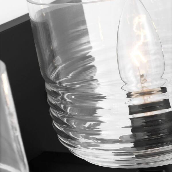 SCOTT LIVING - Lochdale Large 24.25 in. 3-Light Midnight Black Vanity Light with Clear Ribbed Glass Shades