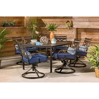 Montclair 7-Piece Steel Outdoor Dining Set with Navy Blue Cushions Swivel Rockers and Dining Table