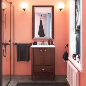 Tricia 24 in. Bathroom Vanity in Walnut w/Composite Granite Vanity Top in White w/White Ceramic Oval Sink and Backsplash